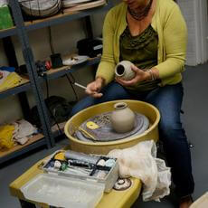 Student at Pottery On The Wheel Saturday Morning workshop at First City Art Center